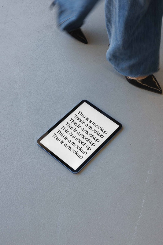 iPad Black Heels Concrete Mockup - Mock Exchange