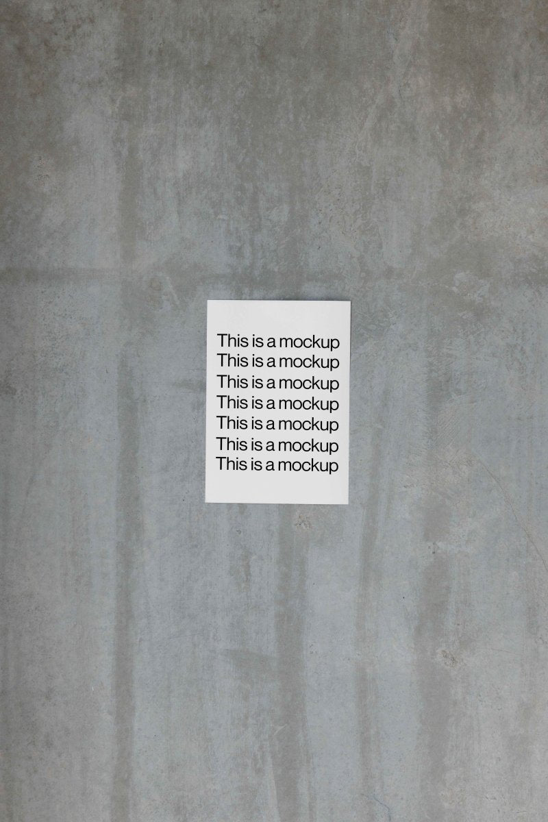 Single Paper on Concrete Wall Mockup - Mock Exchange